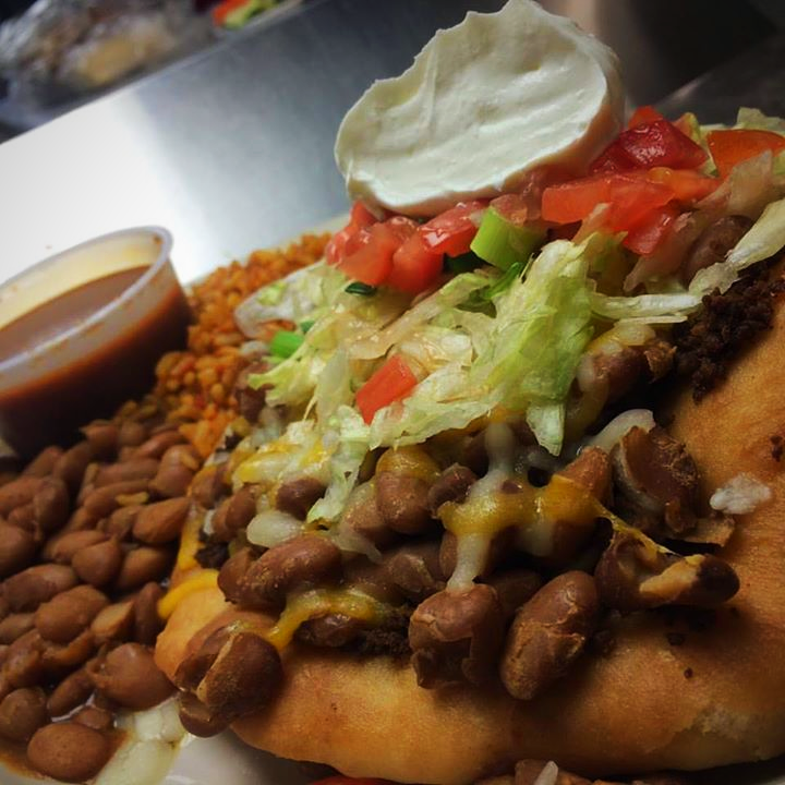 Navajo taco with beans and toppings