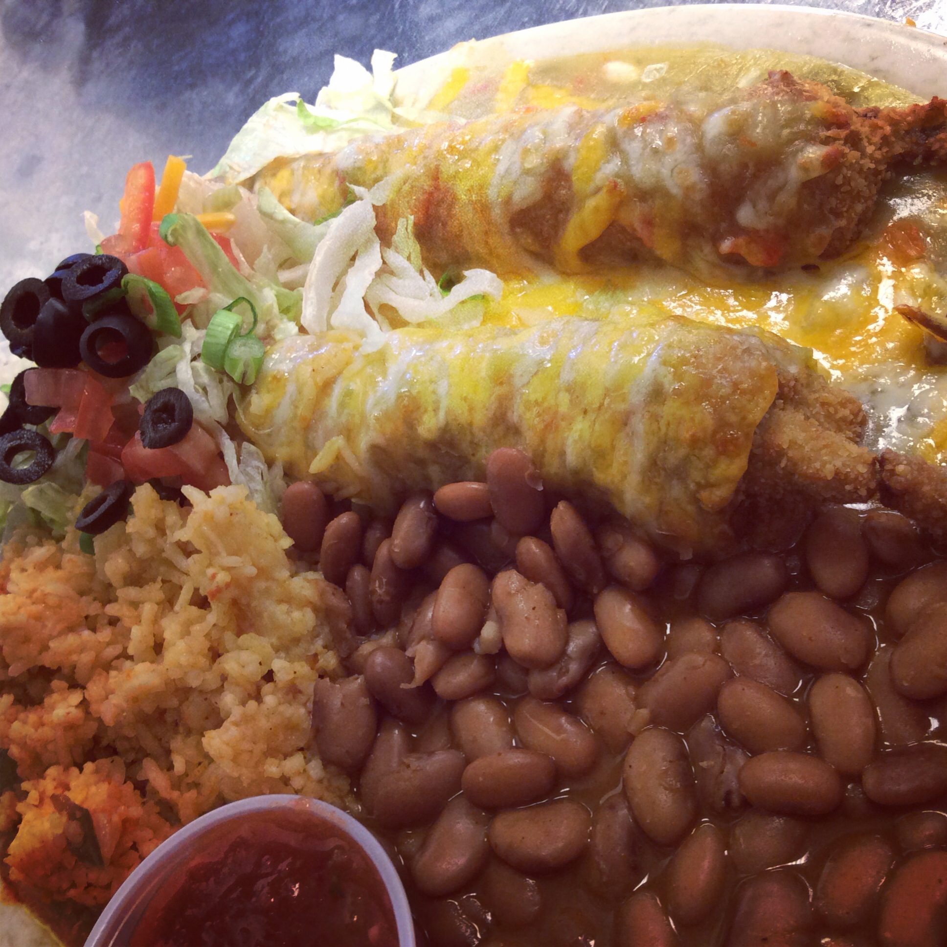 Flautas plate with beans and rice