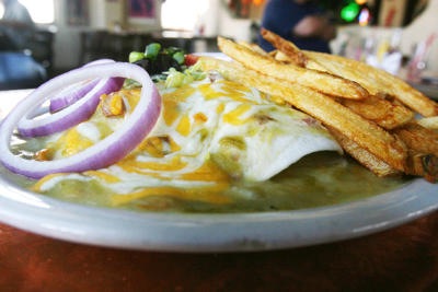 Green chili smothered plate with fries